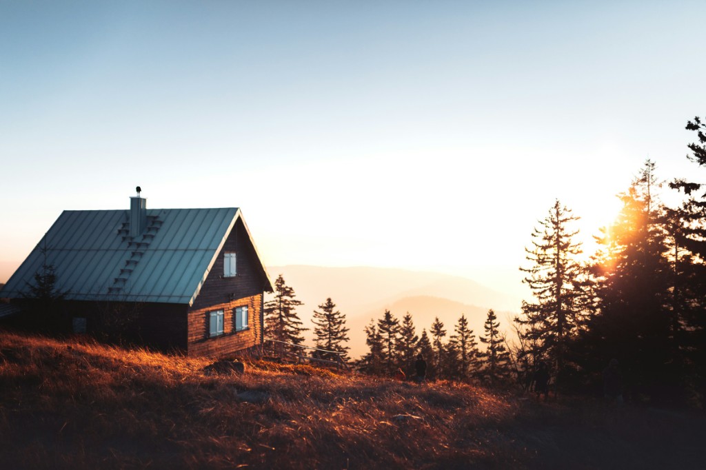 Cozy mountain vacation home at sunset